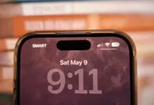 Close-up of iPhone screen showing date and time.
