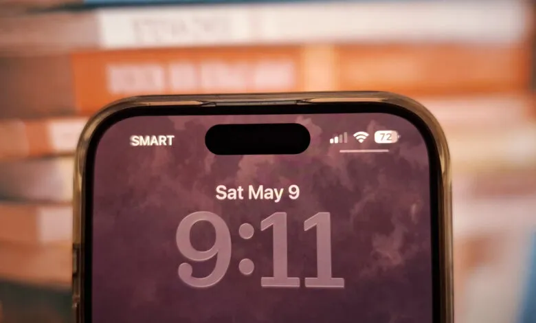 Close-up of iPhone screen showing date and time.