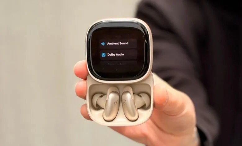 Open earbuds case displaying 'Ambient Sound' and 'Dolby Audio' options.