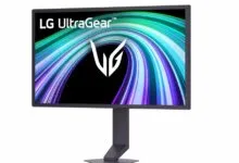 LG UltraGear gaming monitor with a vibrant, colorful display on a stand.