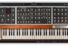 Memory V synthesizer interface with knobs, sliders, and keyboard.