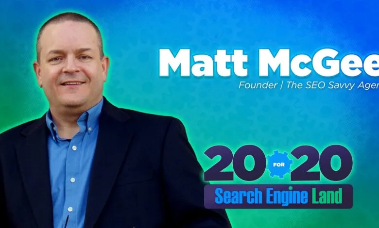 Matt McGee, Founder of The SEO Savvy Agent, portrait on blue background.