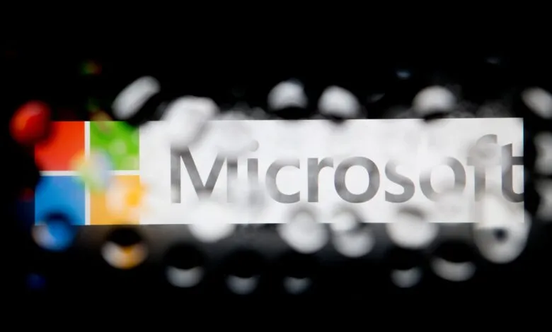Microsoft logo with colorful squares and the word 'Microsoft'.