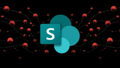 Microsoft SharePoint logo with network of red spheres on black background.