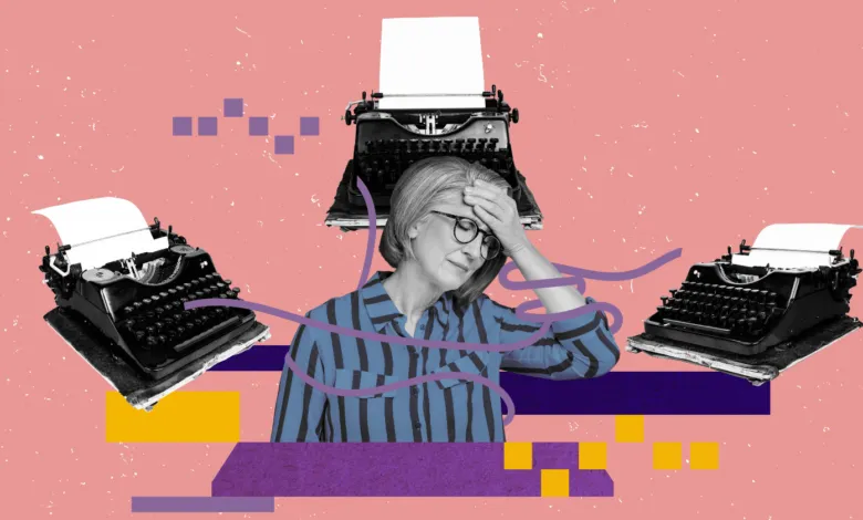 Woman with headache surrounded by vintage typewriters.