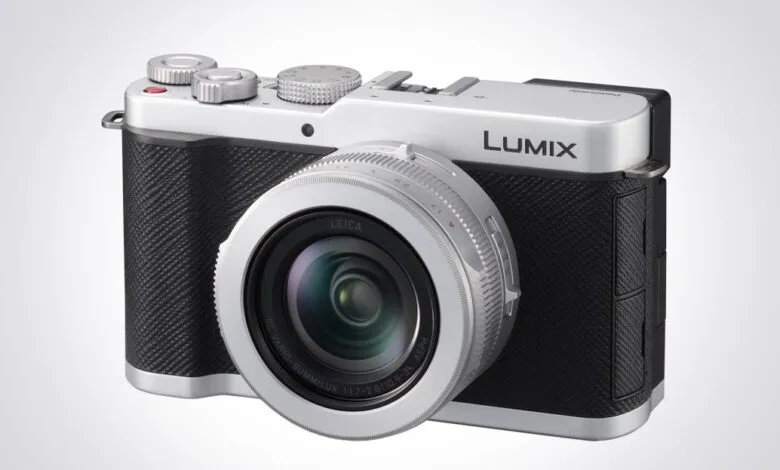 Silver and black Panasonic Lumix camera with Leica lens.