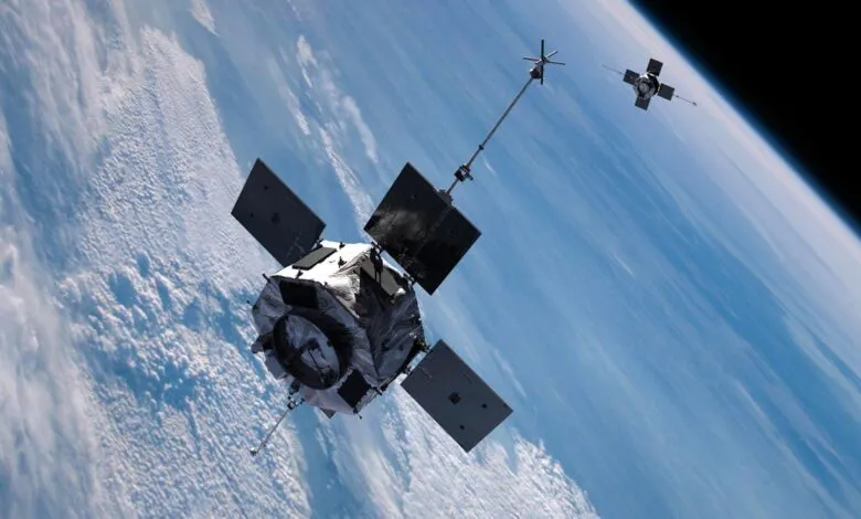 Two satellites orbit Earth, with clouds and blue sky visible below.