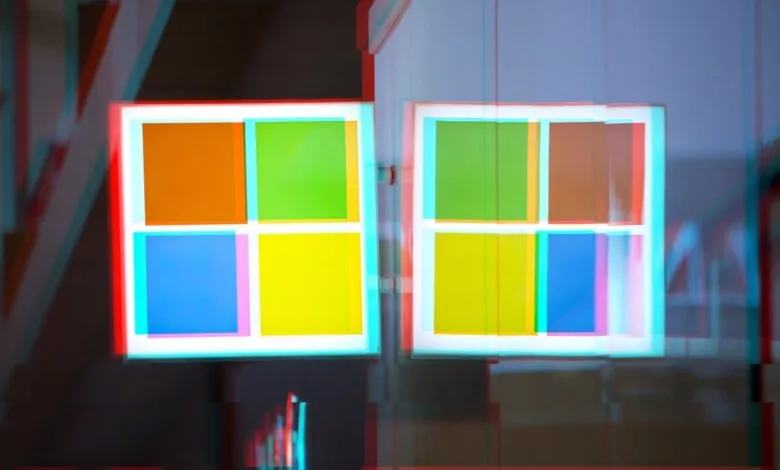 Two distorted Windows logos with vibrant color blocks, creating an anaglyph effect.