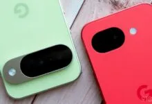 Close-up of two Google Pixel phones, one green and one red, showing camera details.