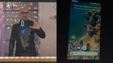 Man takes selfie with Pixel phone showing 'Pixel Ultra Meeting' notification.