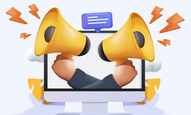 Two hands holding megaphones emerge from a computer screen, promoting a message.
