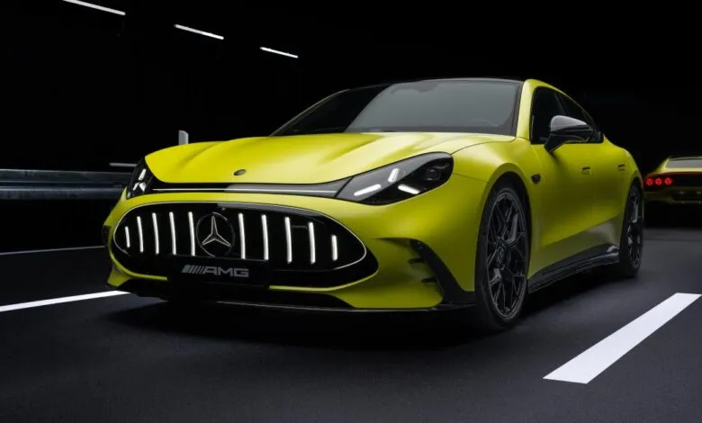Lime green Mercedes-AMG sports car with black accents on a dark road.