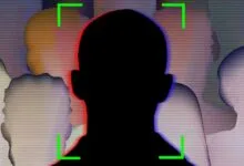 Silhouette of a person's head with facial recognition targeting box.