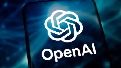 OpenAI logo on a smartphone screen, white on a blue background.