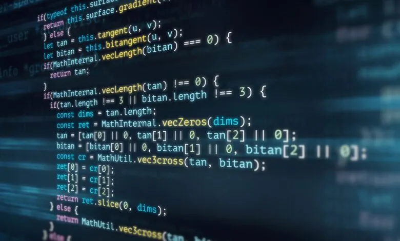 Close-up of computer code on a dark screen with colorful syntax highlighting.