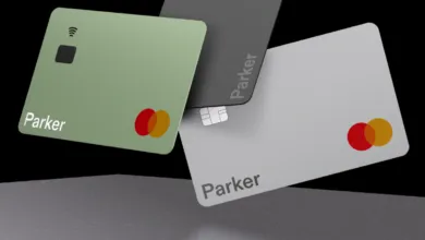 Three Parker Mastercard credit cards in green, gray, and silver.