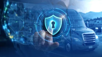 Trucking security concept with shield, map, and semi-truck.