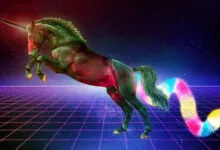 A rearing unicorn with a rainbow slinky tail on a grid background.