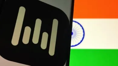 Wispr logo on phone screen with Indian flag background.