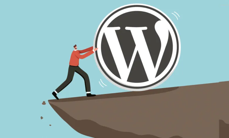 Man pushes WordPress logo off cliff edge, symbolizing website challenges.