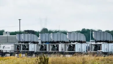 Row of Solaris gas turbines on trailers with exhaust stacks.
