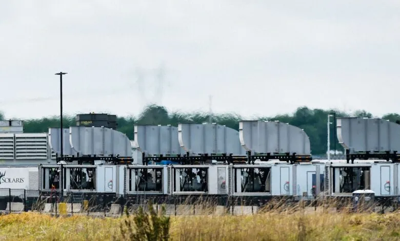 Row of Solaris gas turbines on trailers with exhaust stacks.