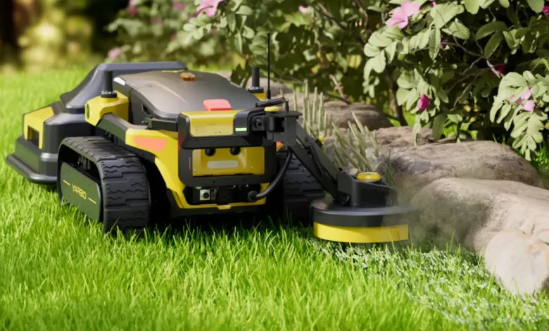 Yarbo robotic lawnmower trimming grass near rock border.