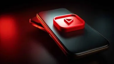 Two smartphones stacked with a red YouTube play button icon on top.