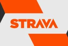 Strava logo in orange against gray and white background.