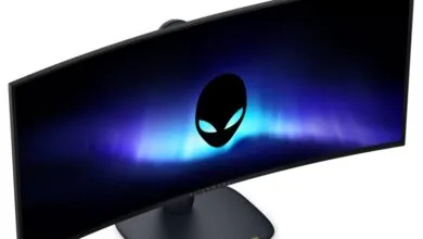 Curved Alienware monitor displaying the Alienware logo on a blue background.