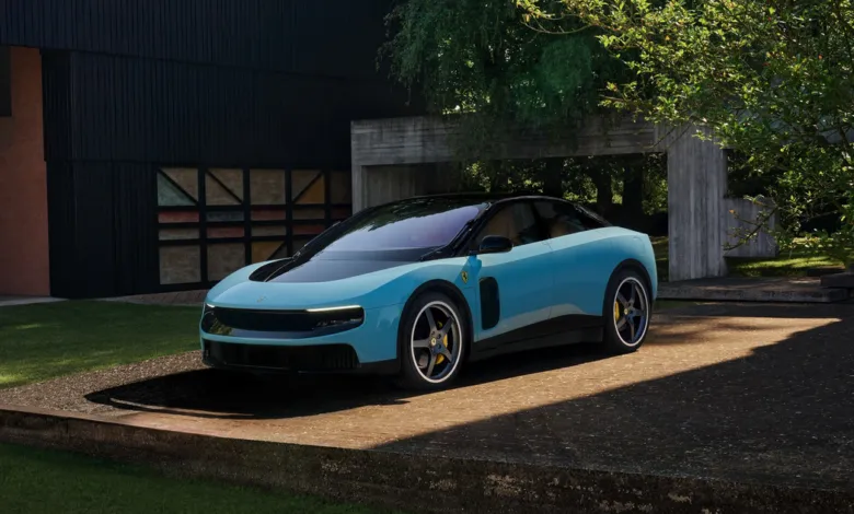 Light blue Ferrari sports car parked outside modern home.