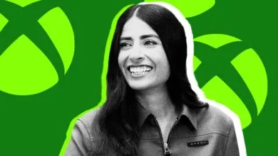 Portrait of Asha Sharma against a bright green background with Xbox logos.