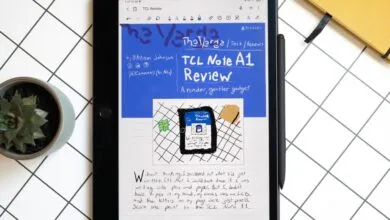 TCL Note A1 NXTPAPER tablet displaying handwritten notes with a stylus on a grid background