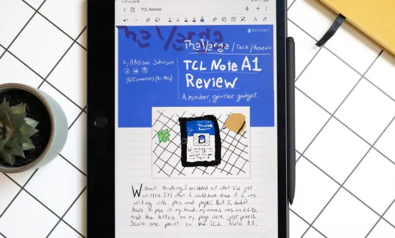 TCL Note A1 NXTPAPER tablet displaying handwritten notes with a stylus on a grid background