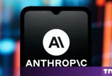 Smartphone displays the white Anthropic AI company logo against a dark background.