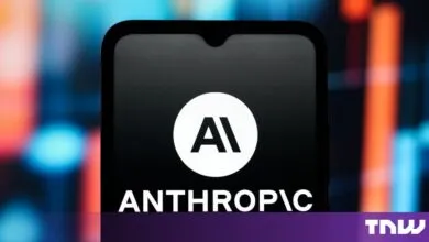 Smartphone displays the white Anthropic AI company logo against a dark background.
