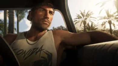 Jason Duval driving a car in a sunny tropical setting with palm trees outside the window.