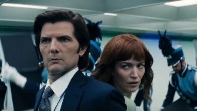 Actor Adam Scott and another person in a scene from the TV show Severance