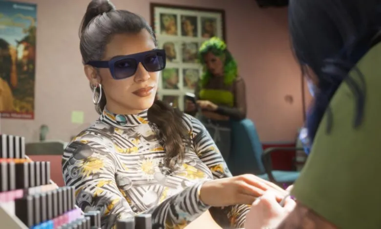 A stylish woman wearing sunglasses getting her nails done in a bustling salon.