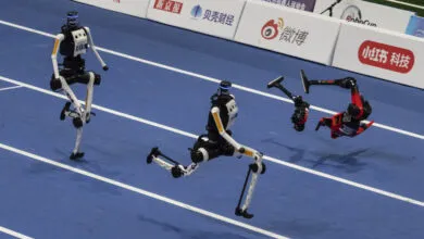 Humanoid Robots Break Records, Catch Fire at World Games