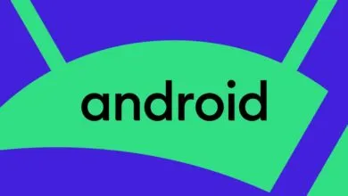 The lowercase black Android logo text centered on a bright green and purple abstract background.