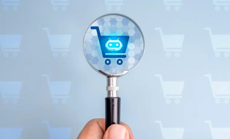 Magnifying glass focused on a blue shopping cart icon with a robot face against a patterned background.