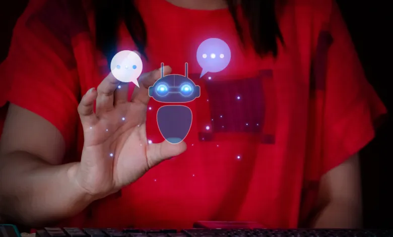 A person in a red shirt interacting with a glowing digital AI robot and chat bubbles.