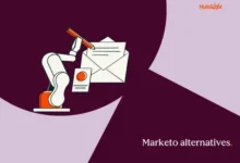 A white robot arm writes a letter next to an envelope on a dark purple background.