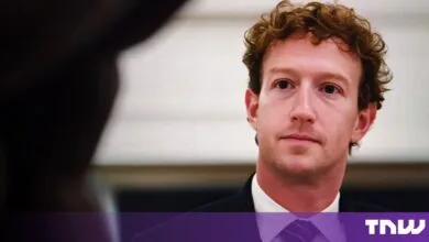 Meta CEO Mark Zuckerberg looking forward in a suit and tie