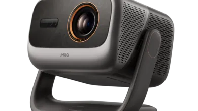 JMGO N3 Ultra Max 4K projector mounted on a sleek dark gray stand against a white background.