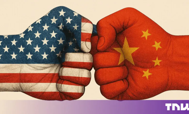 Two clenched fists painted with the American and Chinese flags confronting each other.