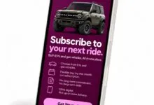 Smartphone displaying the Autonomy app with a Ford Bronco and car subscription details.