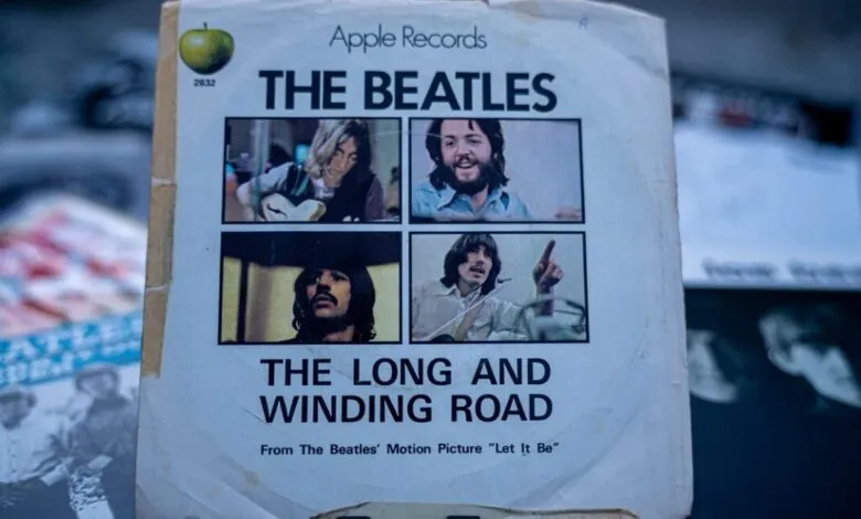 Vintage Apple Records paper sleeve for The Beatles single The Long and Winding Road with four photos