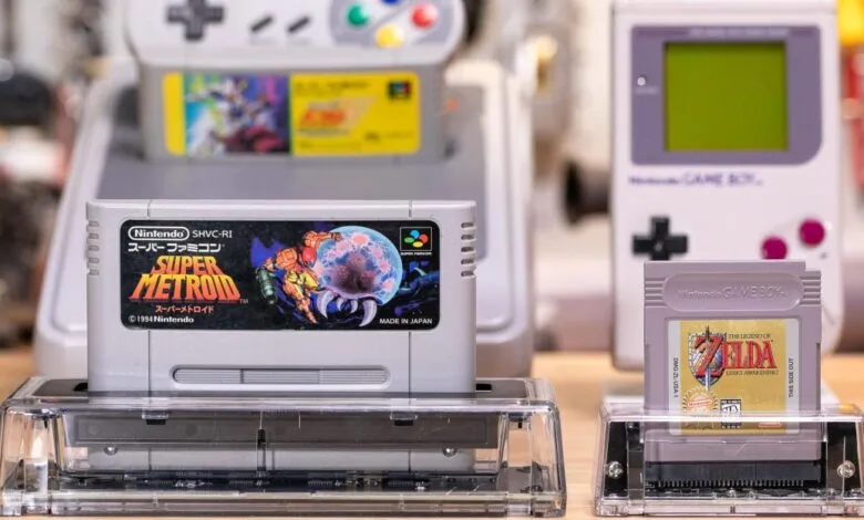 Classic Super Famicom and Game Boy cartridges inserted into transparent Epilogue Operator docks